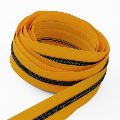 Metallisierter Endlosreißverschluss onyx P10 - 6,5mm gelb